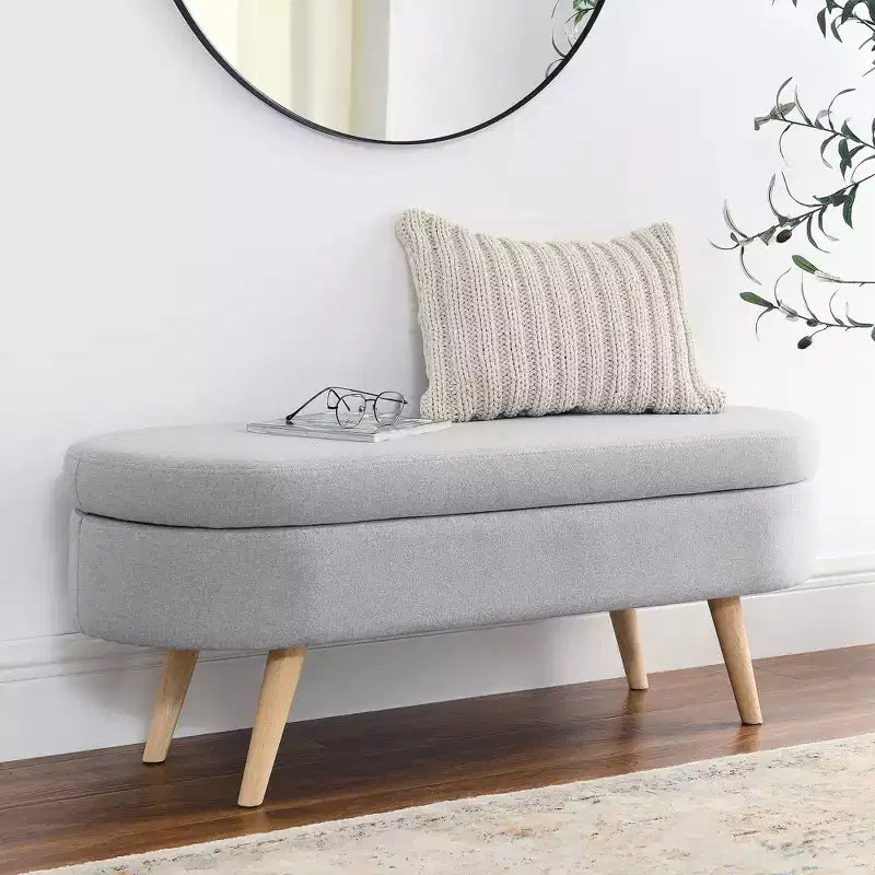 Banc de rangement ottoman ovale avec pieds en bois d'hévéa (43,5x16x16)