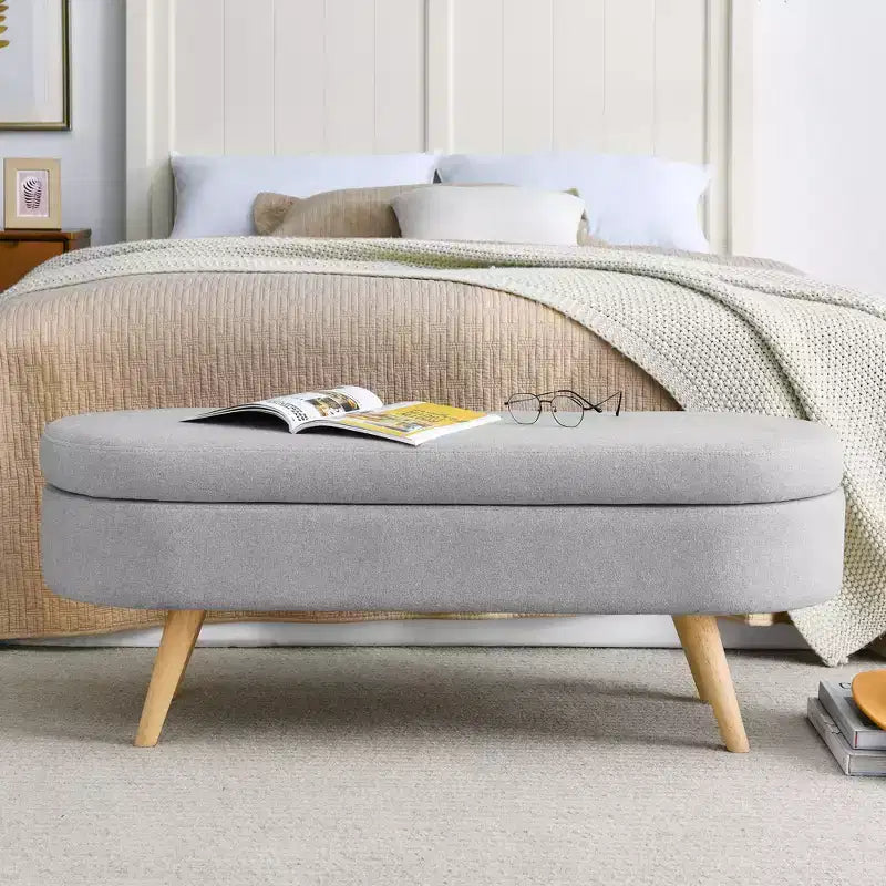 Banc de rangement ottoman ovale avec pieds en bois d'hévéa (43,5x16x16)