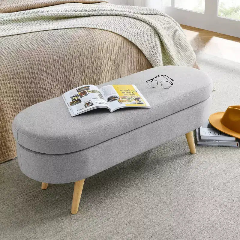 Banc de rangement ottoman ovale avec pieds en bois d'hévéa (43,5x16x16)