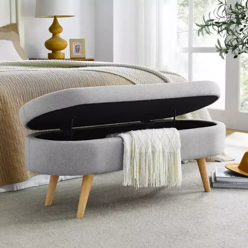 Banc de rangement ottoman ovale avec pieds en bois d'hévéa (43,5x16x16)