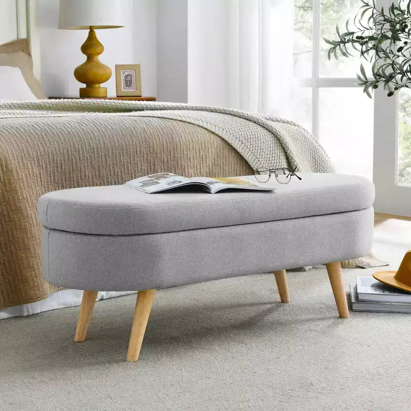 Banc de rangement ottoman ovale avec pieds en bois d'hévéa (43,5x16x16)
